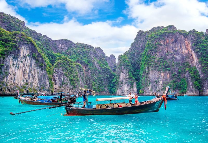 KRABI - DECEMBER 1: Long boat and tourist at Maya bay in Phi Phi Island. Photo taken on December 1,2016 in Krabi, Thailand.